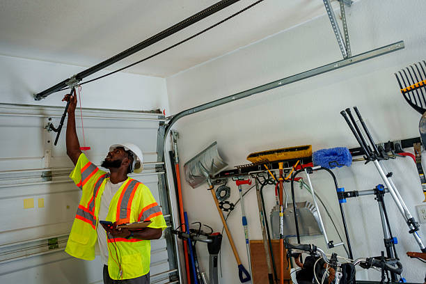 Professional Garage Door Panel Replacement technician working in DeKalb County County, IN